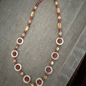 Elegant Beaded Necklace with Red and Cream Accents